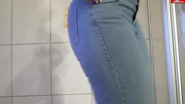 Pissing in her jeans