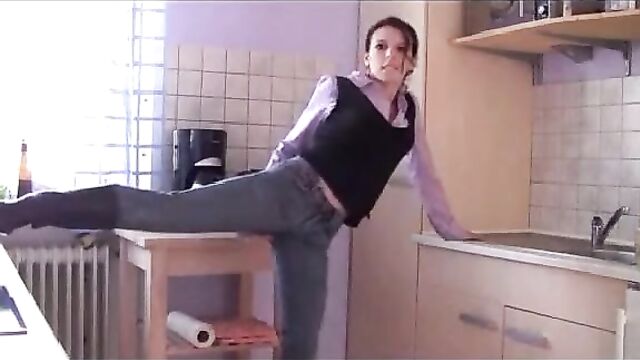 pretty brunette peeing in tight jeans