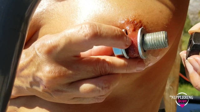 nippleringlover inserting huge screws in stretched nipple piercings nude outdoors - big labia ring