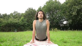 Naked yoga in public park