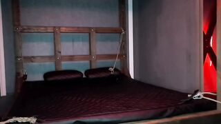 Dominatrix Nika tied the slave's balls with ropes and flogged them. Punching in the balls