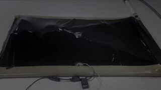 latex vacbed orgasm with vibrator and e-stim