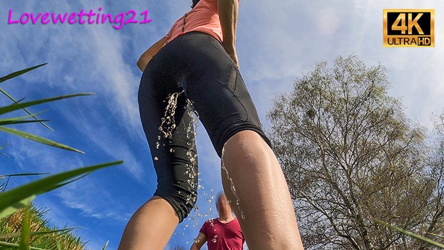 this slutty jogger pees in her leggings in front of a stranger to fuck