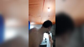 with the prostitute at home giving him hard by the tail