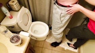 Helping my neighbor by holding his dick while he pees in the toilet while my boyfriend's at work
