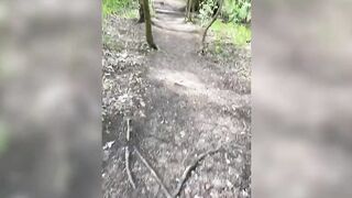 A whore pissing in the forest, almost pissing in her pants ...
