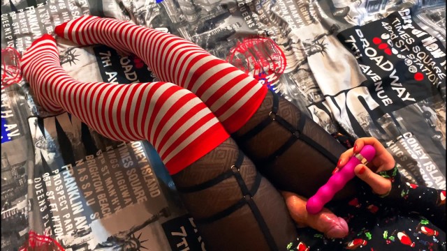 Trans Christmas Elf caresses herself with a vibrator