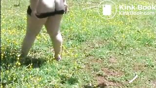 Fat woman shitting in the field