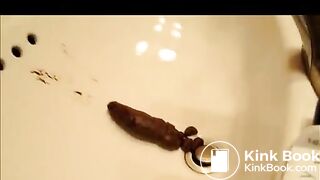 Curly girl shitting in the Sink