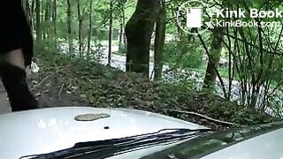 Girl liquid shitting on a white car hood