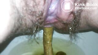 LARGE TURD INTO TOILET
