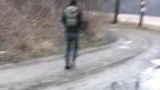 Girl shit and pissing on a bench by the stone wall - Pooping