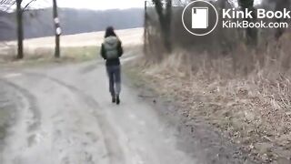 Girl shit and pissing on a bench by the stone wall - Pooping