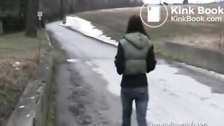 Girl shit and pissing on a bench by the stone wall - Pooping