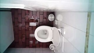 Webcam in the toilet and pooping woman