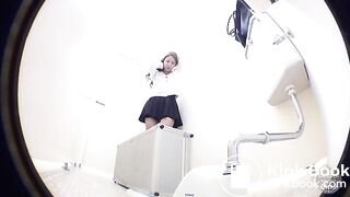 Asian Babe shits over suitcase