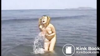 Girl poos in the sea