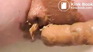 dildoed_ass_shitting
