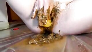 Scatgirl playing with veggie and fisting her pussy