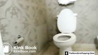 Brown haired teen pooping in reverse position