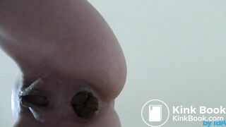 Poo standing from below