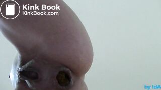 Poo standing from below