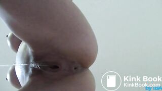 Poo standing from below