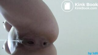 Poo standing from below