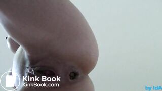 Poo standing from below