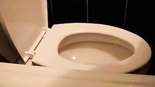 Girl pooping on toilet