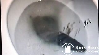 Vintage video of a brunette milf shitting a big one