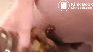 dildoed_ass_shitting