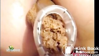 Shitting through speculum