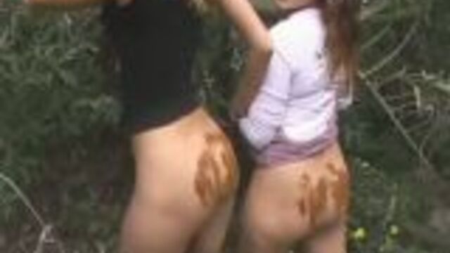 Lesbians shitting in the woods