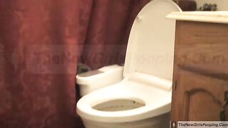 sexy Josie in toilet shits from side view