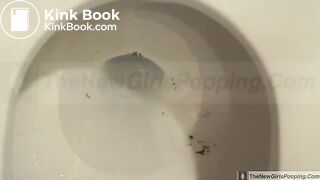 sexy Josie in toilet shits from side view