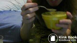 girl enjoys eating  scat custard and pudding