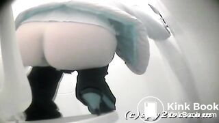lady puking in public toilet