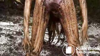 Girl rolling in pig shit pit