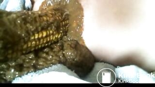 Scatting With Corn Cob In Ass