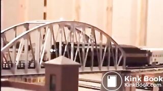 Woman Shits on a Model Train