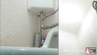 Toilet Cam Captures Shitting Girl