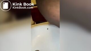 Me taking a dump into our sink