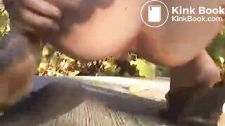 Hot blonde taking a shit outside in public