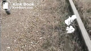Shitting and pissing on a train track