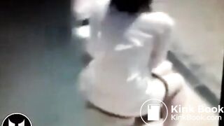 Woman Shitting At Bus Stop