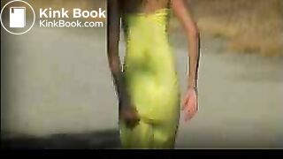 Green dress at beach