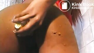 Hot ebony girl playing with shit in the bath - Scat Video Collection