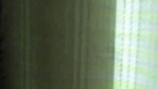 Woman scat in toilet with a beautiful view from the window