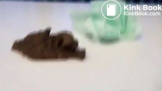 Anya pooping on table